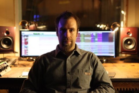 Portrait of Aurelio Estebanez in the control room