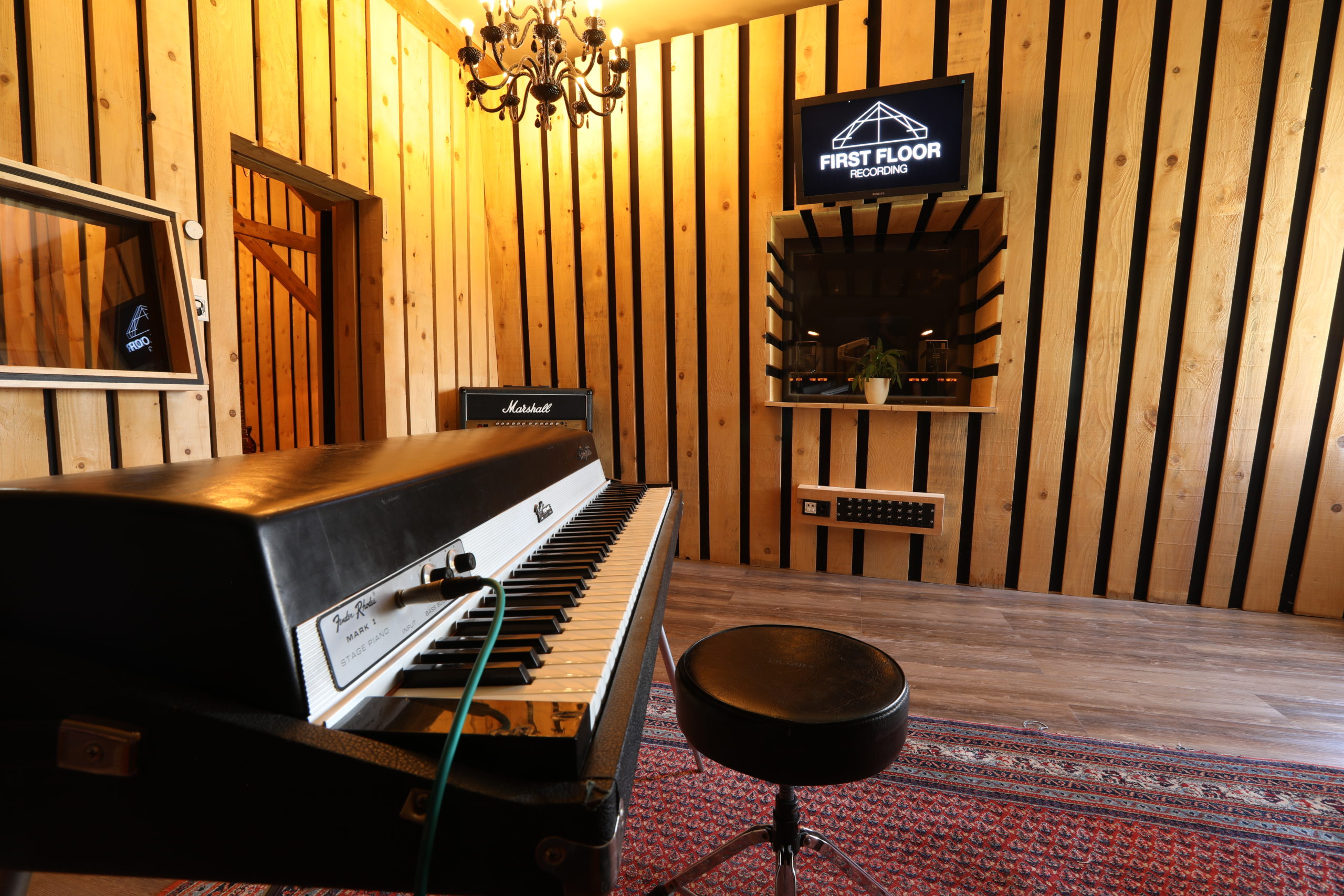 Electric piano and control-room window
